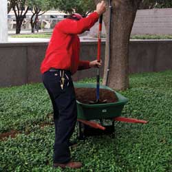 man working on yard
